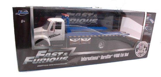 Immagine di INTERNATIONAL DURASTAR 4400 FLAT BED FAST & FURIOUS 1:24