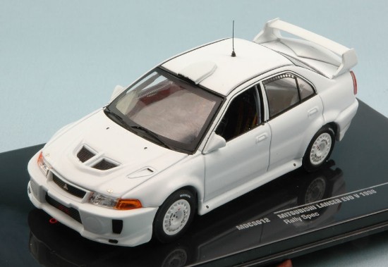 Immagine di MITSUBISHI LANCER EVO V RALLY SPEC.1998 WHITE + 4 RUOTE DI SCORTA 1:43