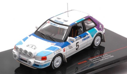 Immagine di MAZDA 323 GTX N.5 1000 LAKES RALLY 1990 W/NIGHT LIGHTS SALON./SILAN.1:43